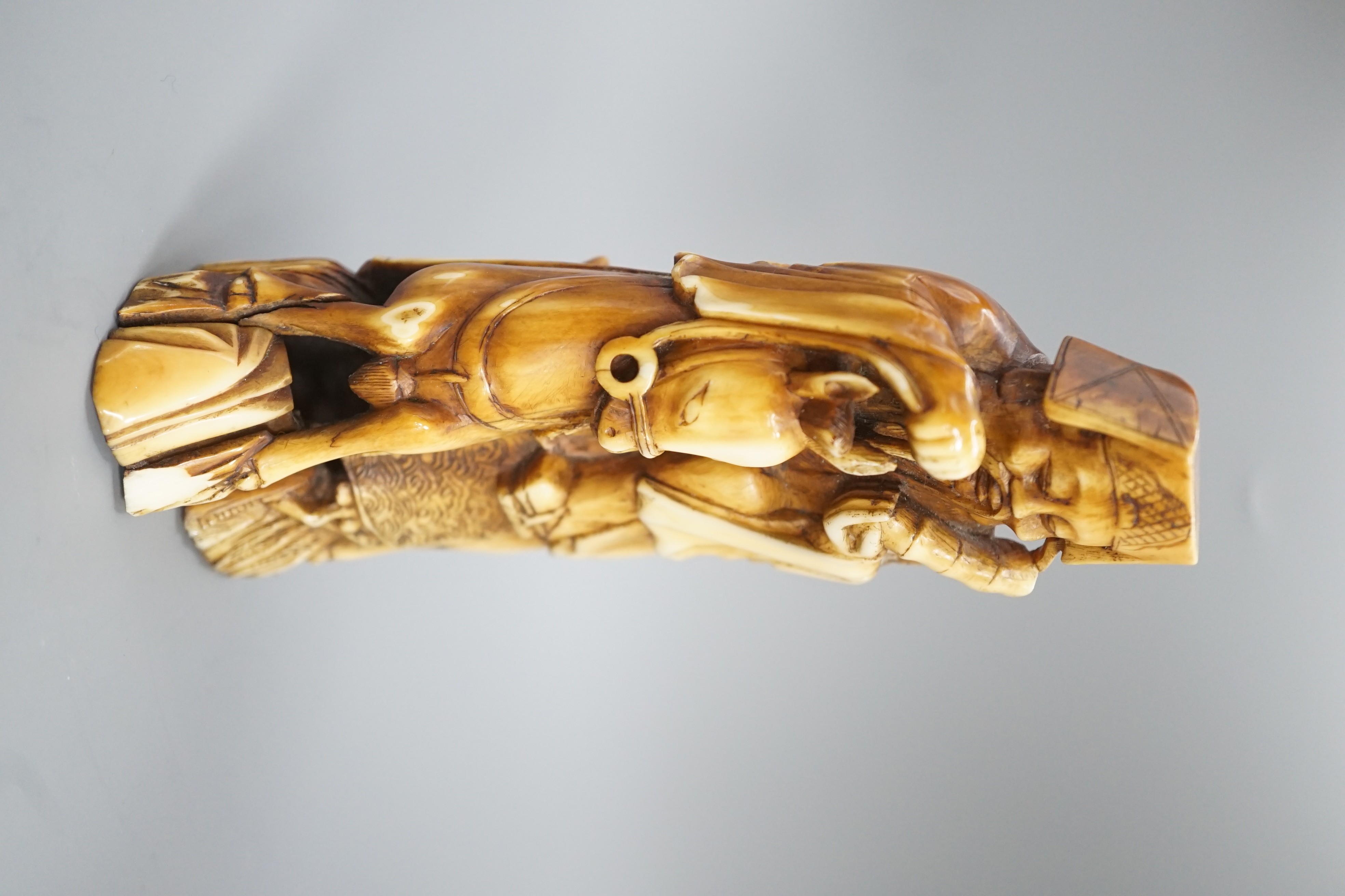 A Chinese hippopotamus ivory group of Zhang Guolao riding a horse, 19th century 14cm